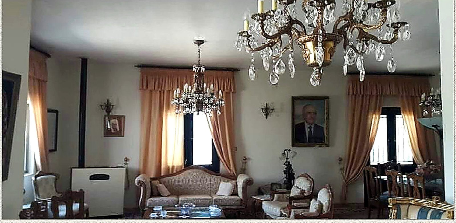 Finished formal living room with freshly painted walls and ceiling